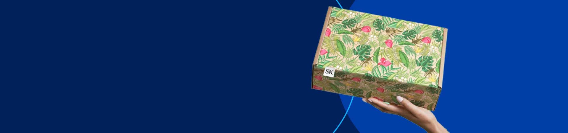 Emballage en carton ondulé pour ecommerce de mode avec impression de jungle à l'extérieur